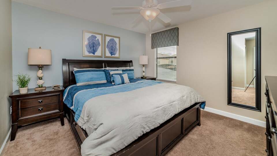 King Bedroom 6 Upstairs Shared Bathroom 40" TV