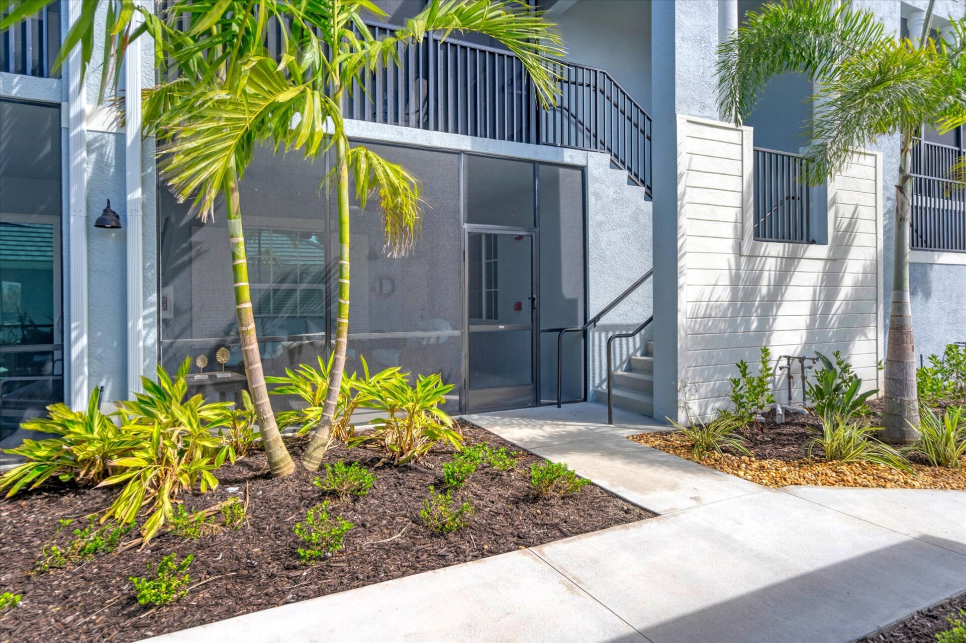 Front lanai features ample seating and a 50-inch Smart TV. Great for entertaining