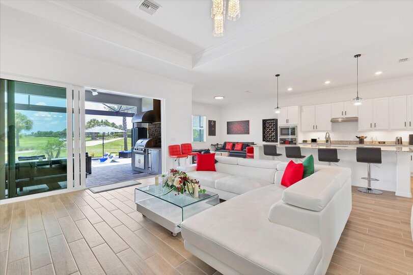 Bright, open living space overlooking the private pool