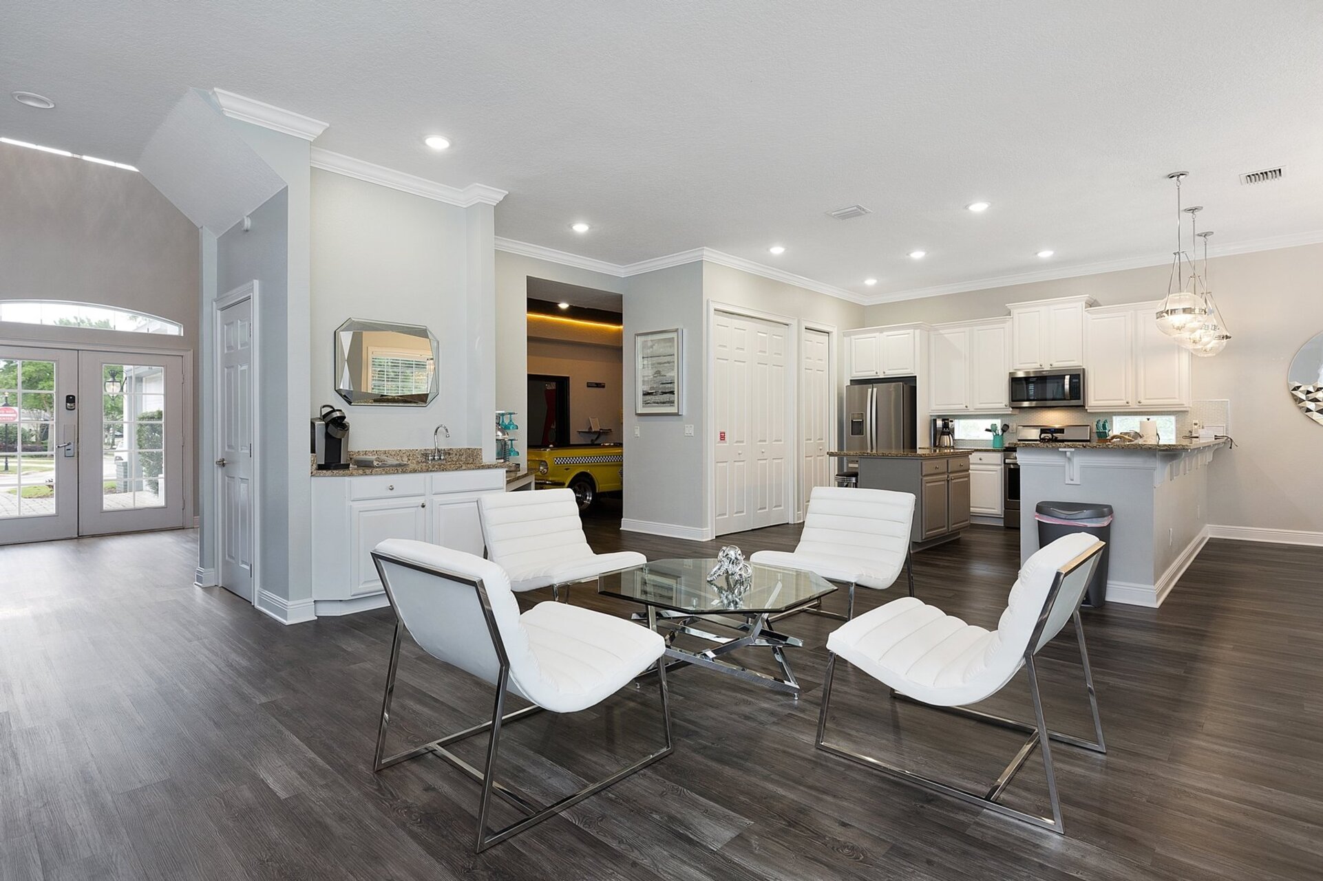 Relax as a family in the seating area by the wet bar that seats 4