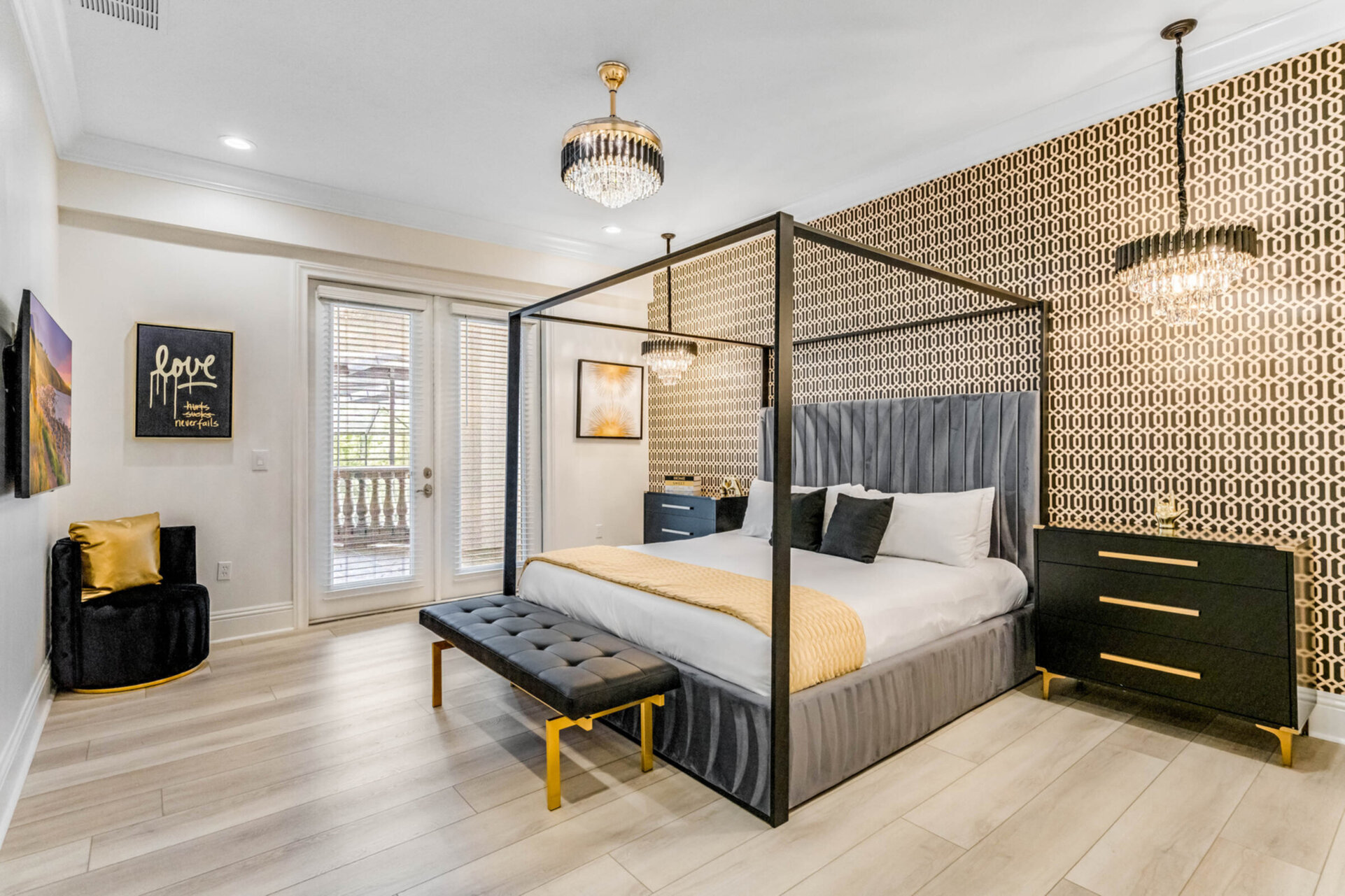 Master suite #8. King size bed, access to balcony, en-suite bathroom, and SMART TV
