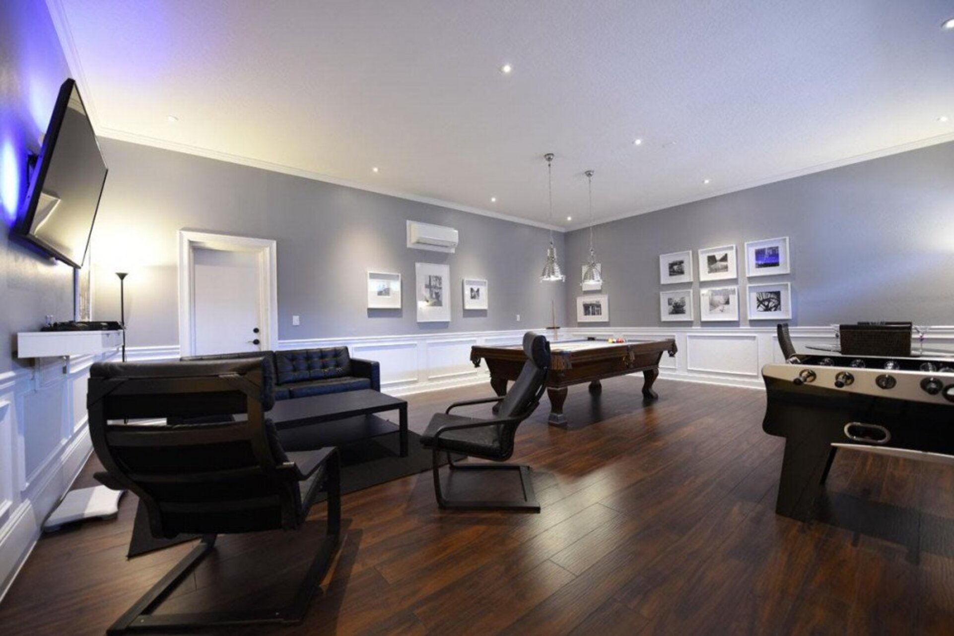 Fun games room with pool, foosball and Playstation 4 gaming system