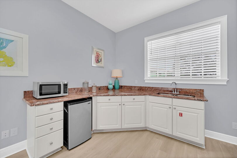 Complete with a mini-fridge, microwave and sink so you don`t have to go all the way to the kitchen for a midnight snack