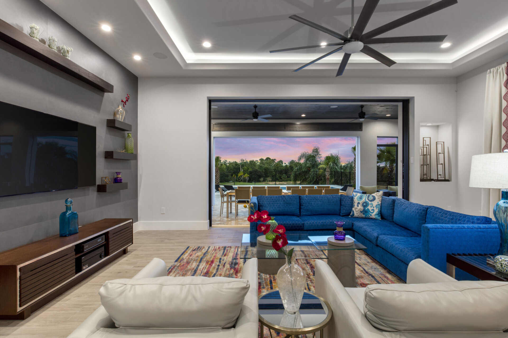 The open floorplan and large sliding glassdoors provide you great views