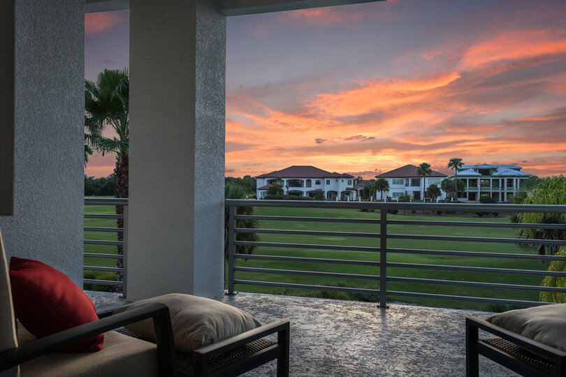 Take in the scenic views of the golf course from the private patio balcony