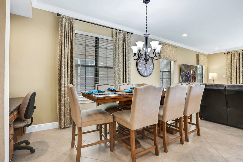 The dining table comfortably seats 8 people