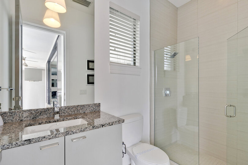A full bathroom located on the pool deck