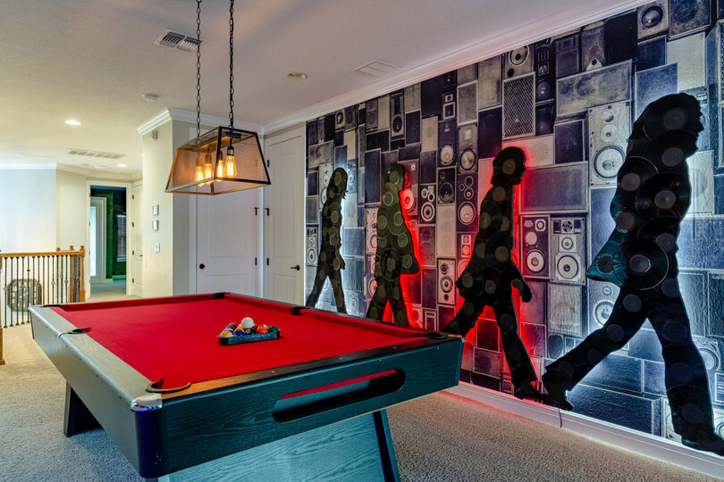 Play a friendly competition of pool with your family and friends