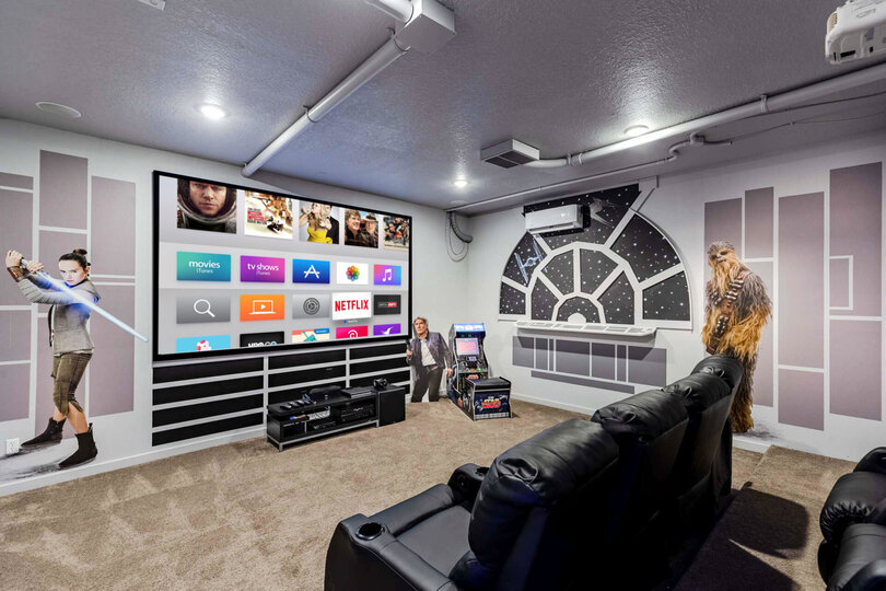 Head into the galactic theater and games room with theater seating for 7