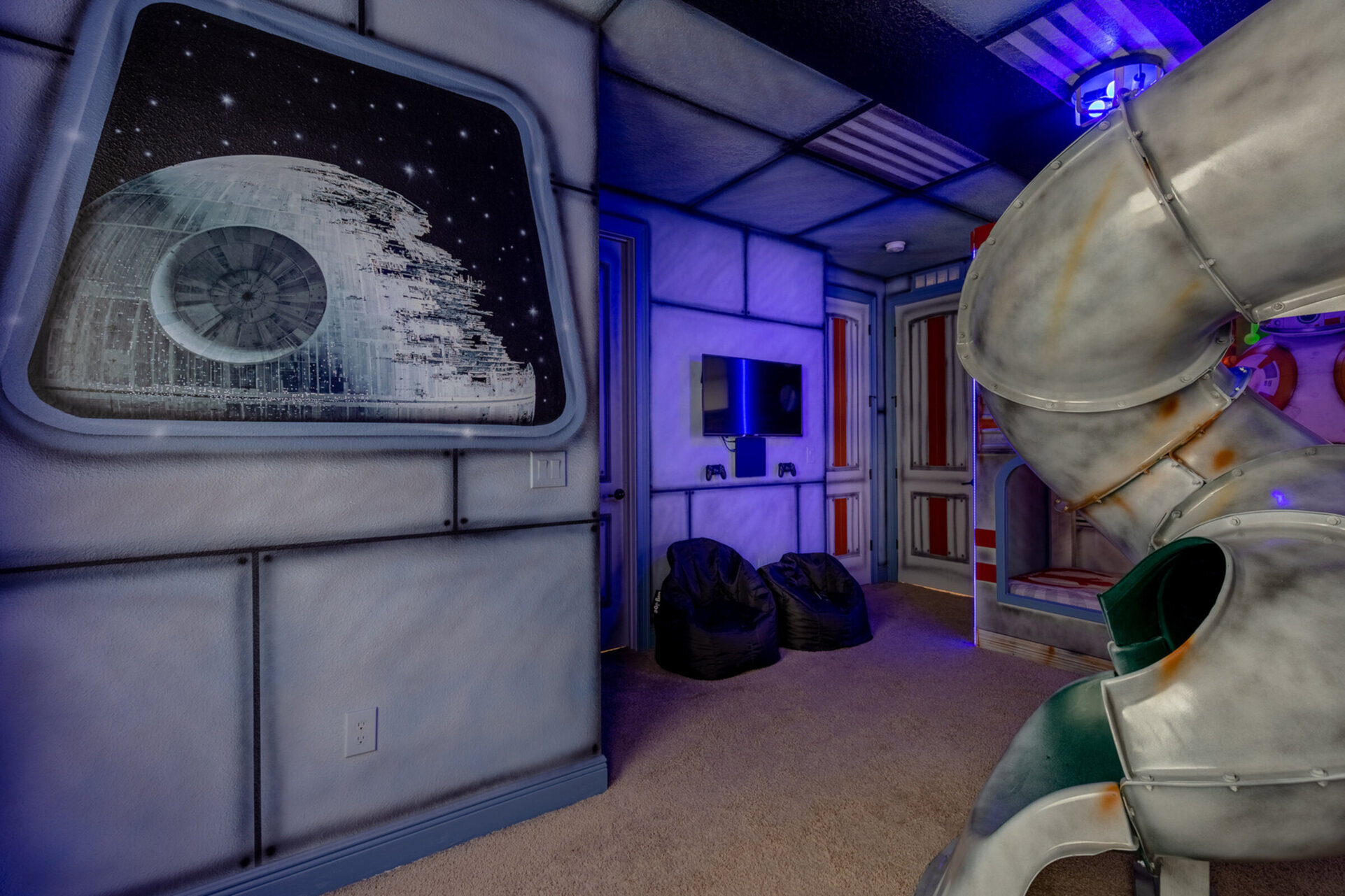 Kids will love the gaming area with beanbag chairs and TV