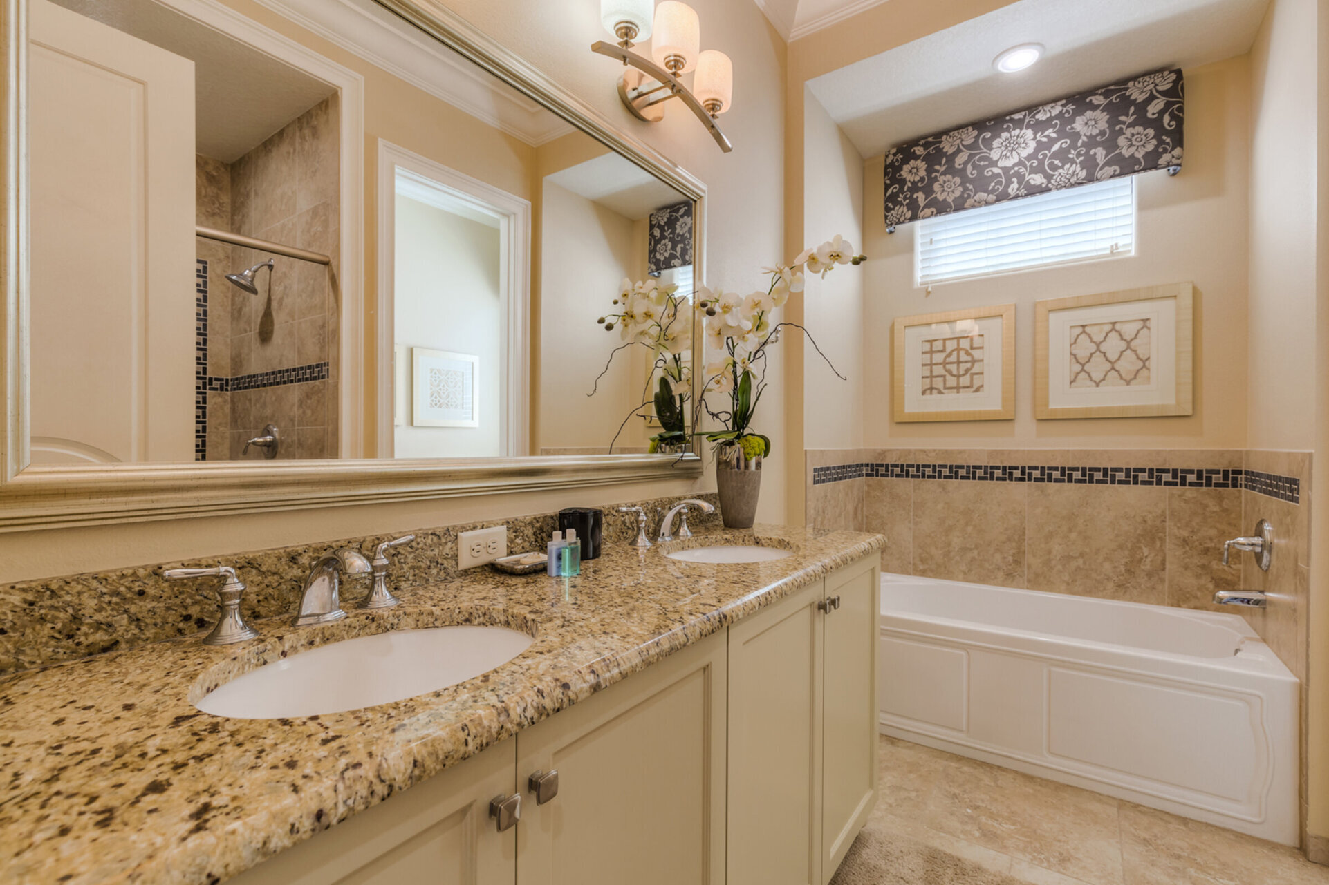 The en-suite bathroom 4 has a bathtub and glass walk-in shower
