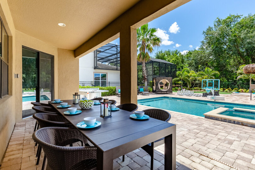 Dine al fresco under the covered patio with seating for 8