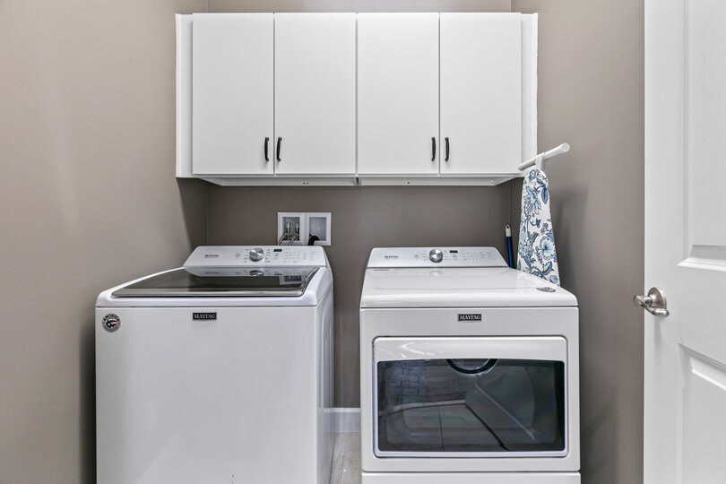 Washer and dryer on the first floor.