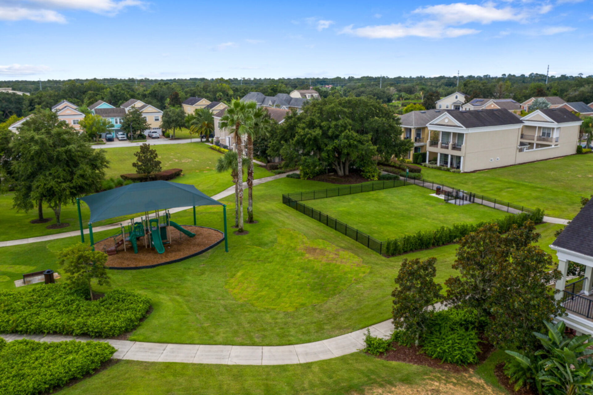 A pathway leads from the home to the playground