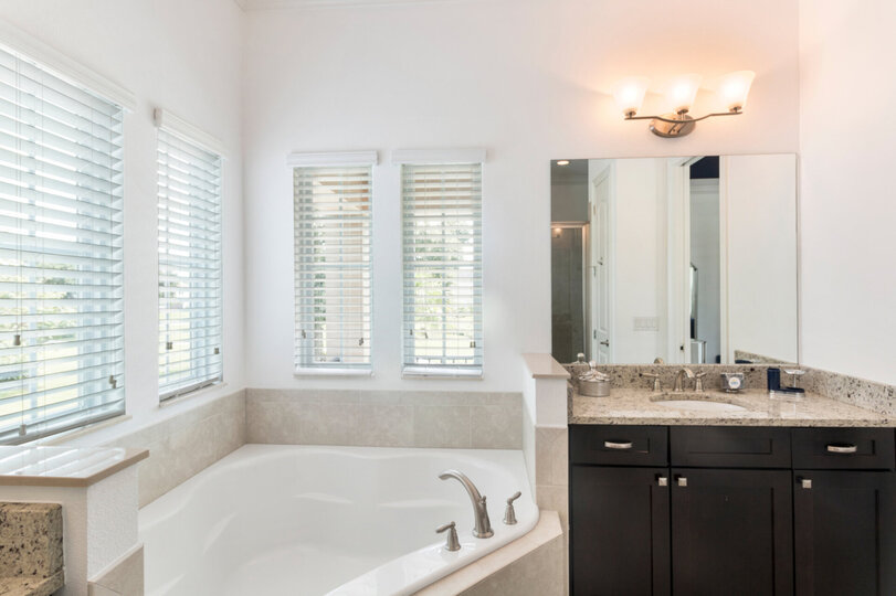 Two sinks and a luxurious tub to soak in
