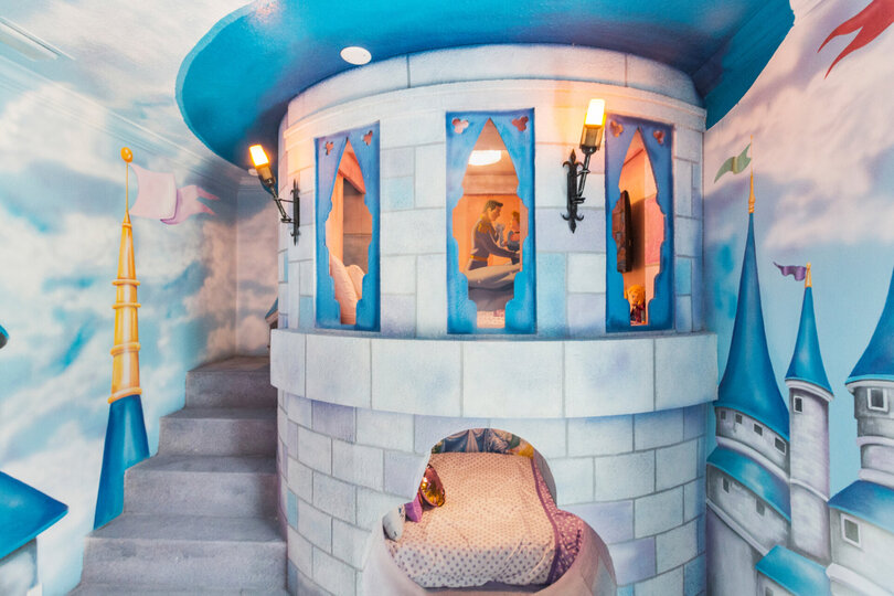A magical castle awaits princesses in this amazing custom built full over full bed