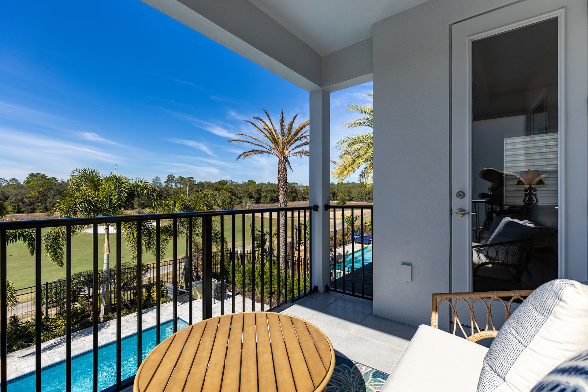 "The Royale Dream Suite" features its own balcony with views of the pool and golf course.