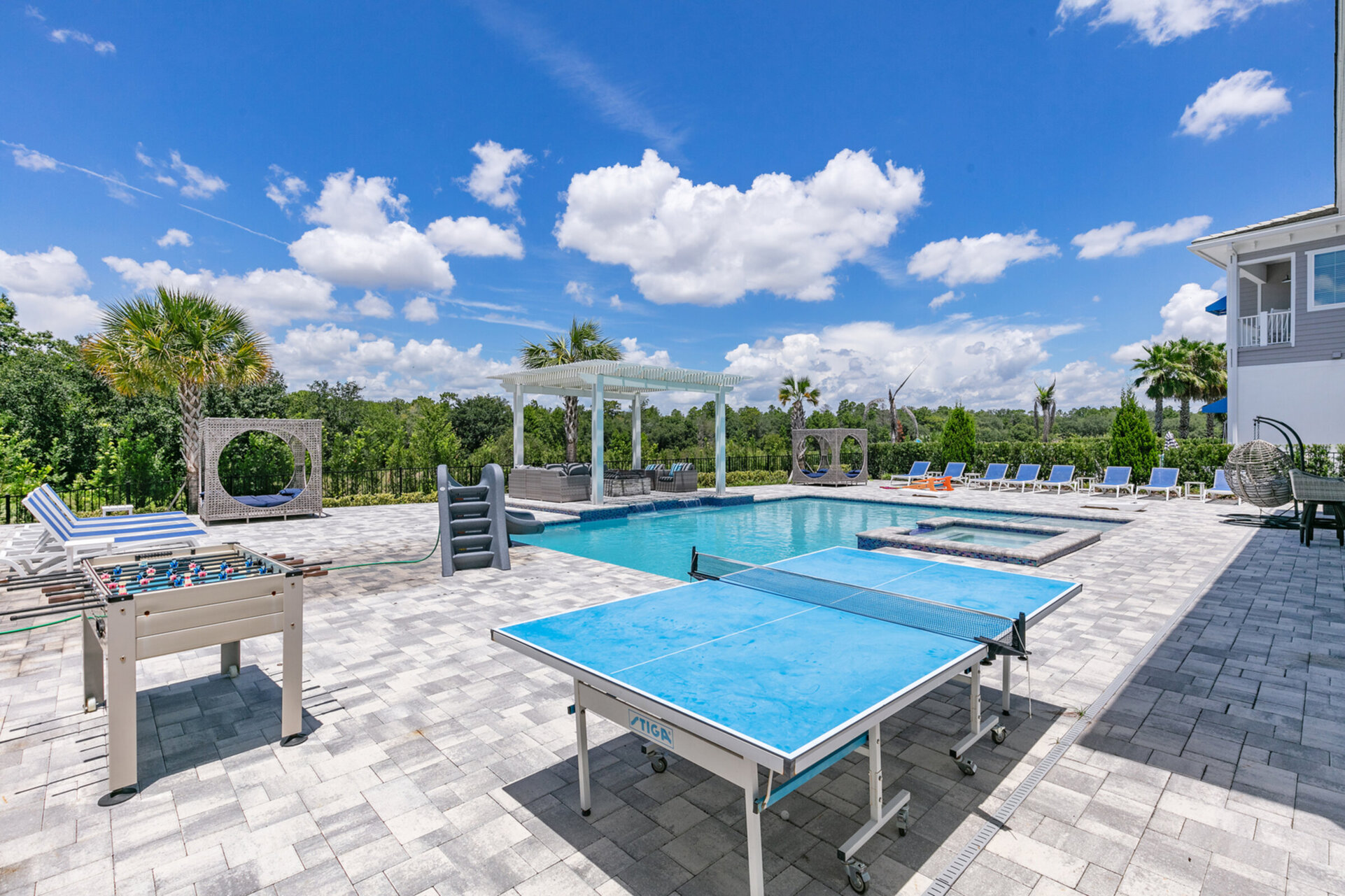 Enjoy a game of foosball or ping pong by the pool
