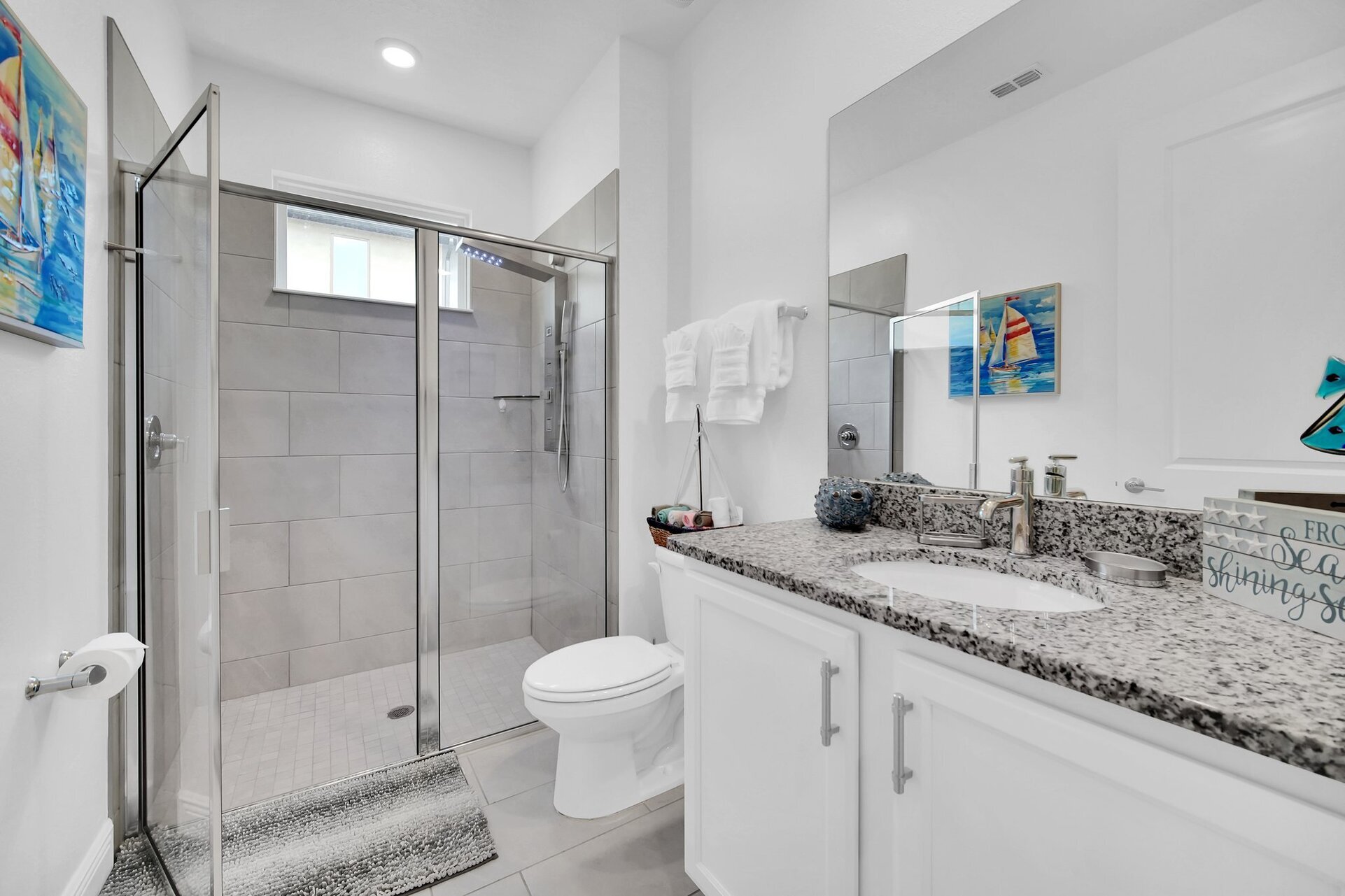 Family bathroom with walk in shower on the ground floor.
