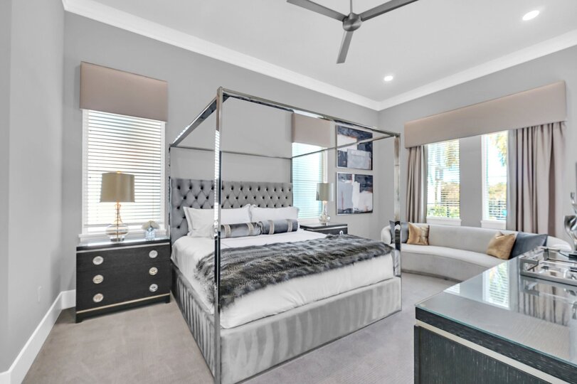 Indulge in luxury and relaxation in this king bedroom. Unwind in style with a cozy sofa and enjoy the convenience of an en suite bathroom