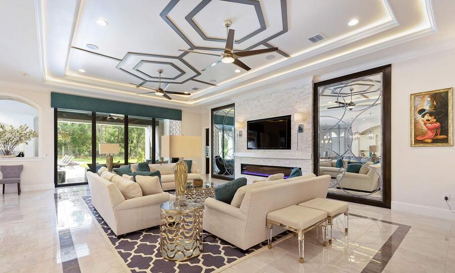 This modern themed living area features a fantastic open concept floorplan perfect for the larger group vacations