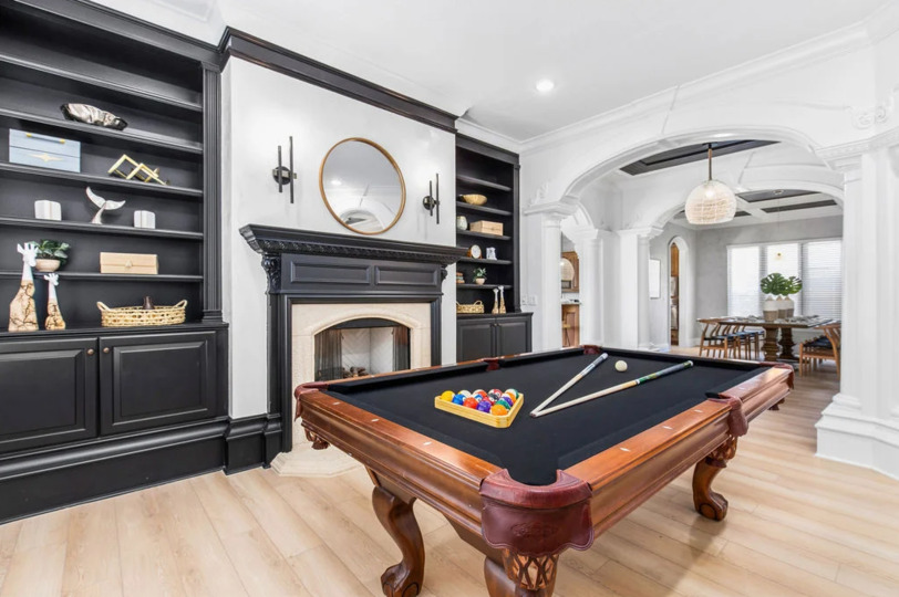 Challenge your friends and family in a game of pool, a dedicated space designed for exciting game nights