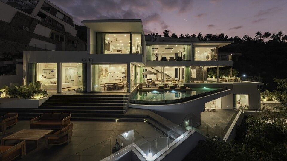 Golden Lotus - Villa Vie - Gleaming modern luxury villa at dusk