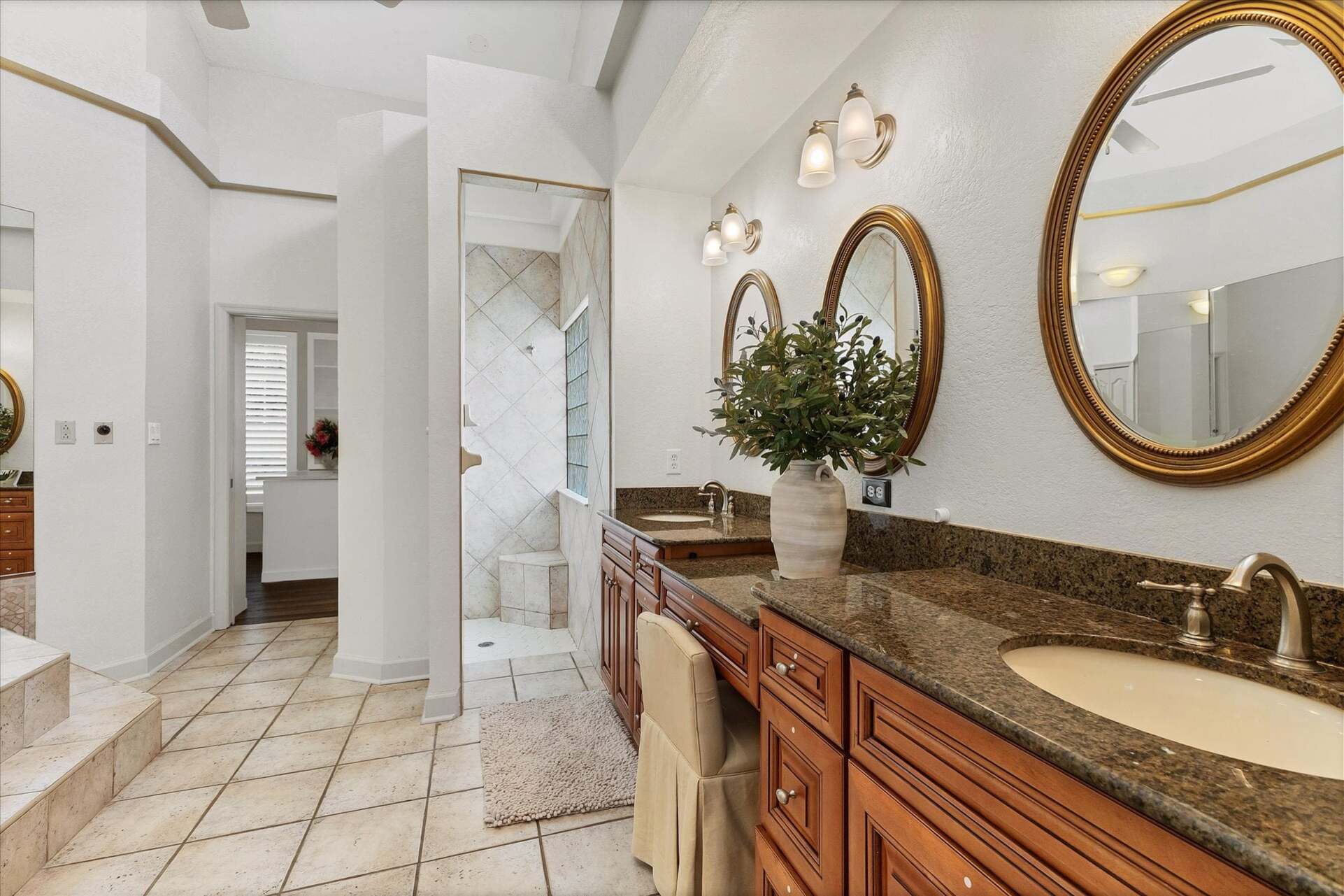 Ensuite includes a walk-in shower, double vanities, and a bathtub