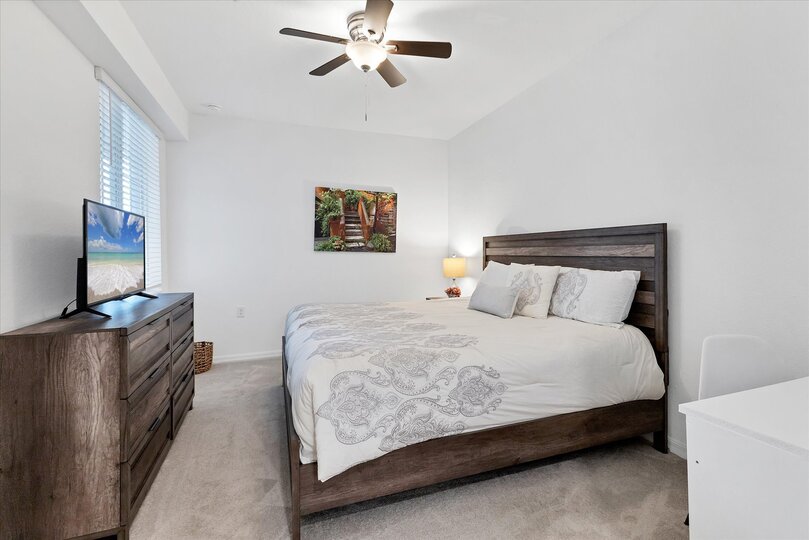 Bedroom 1 with king bed, ensuite, and 42-inch Smart TV