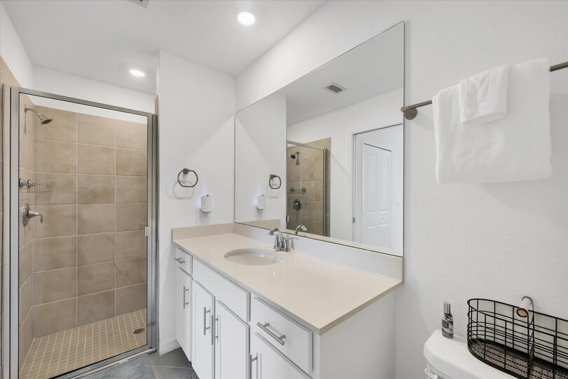 Guest shared bathroom with walk-in shower