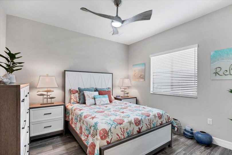 Guest bedroom 2 with a queen bed and 43-inch Smart TV