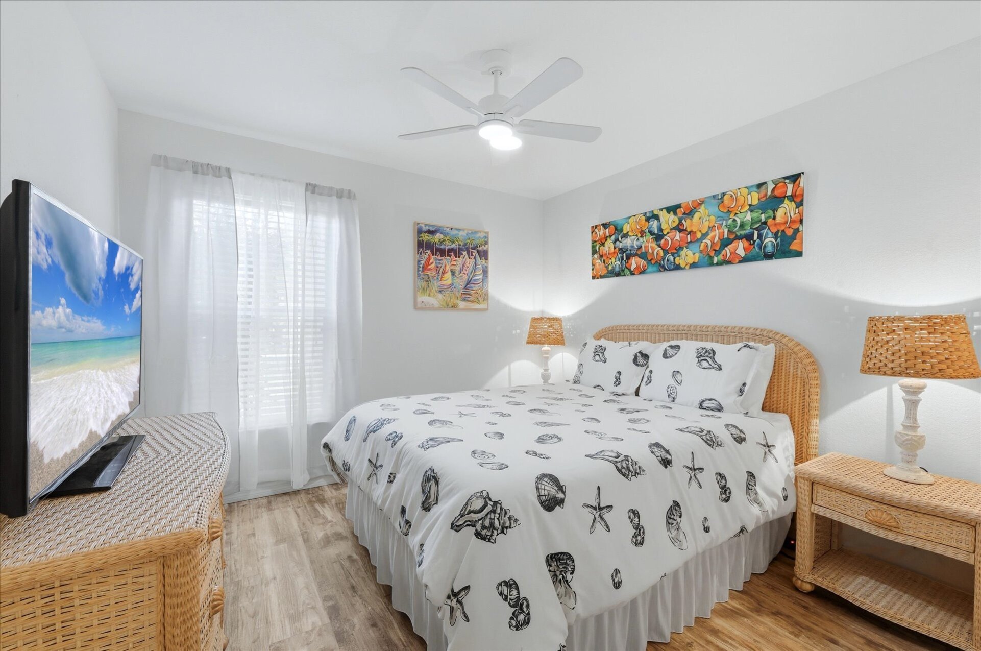 Guest bedrom with queen bed and 55-inch Smart TV